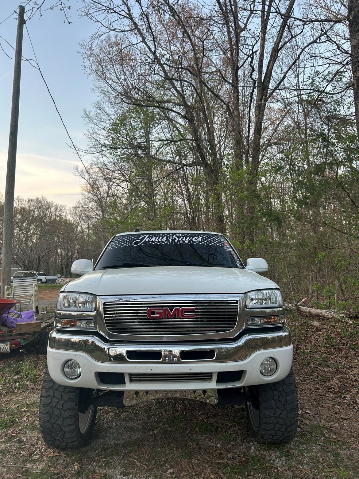 Windshield banner on a lifted GMC truck