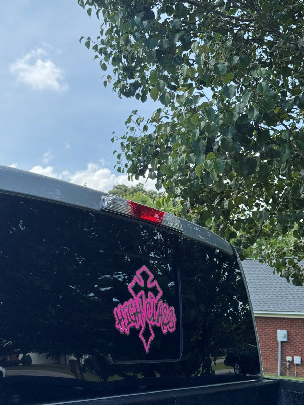 High Class cross decal on rear window